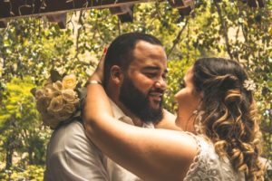 Bearded man celebrating anniversary with wife outdoors